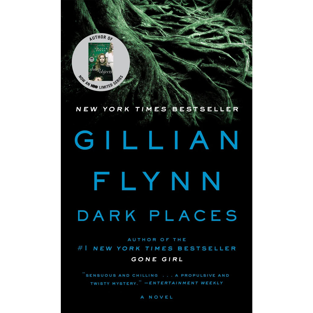 Book cover of 'Dark Places' by Gillian Flynn with green tree branches and author's name displayed.